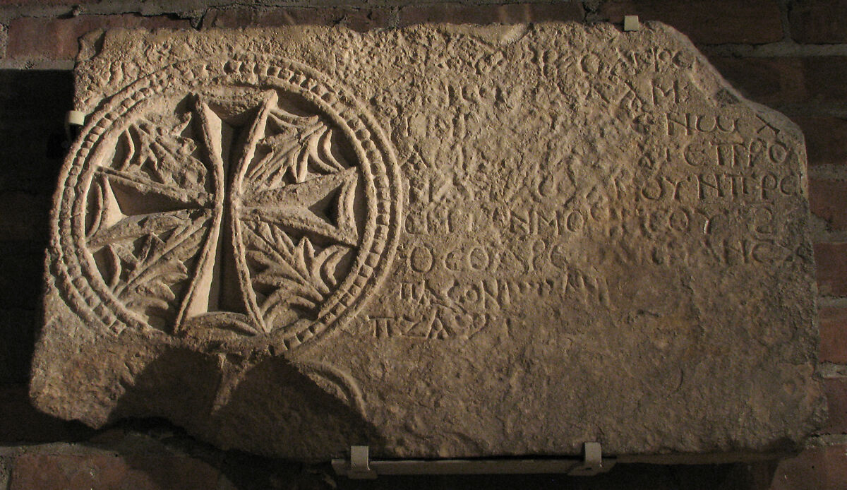 Fragment from a Funerary Stele with a Medallion of a Cross and Leaves, Limestone; carved in relief