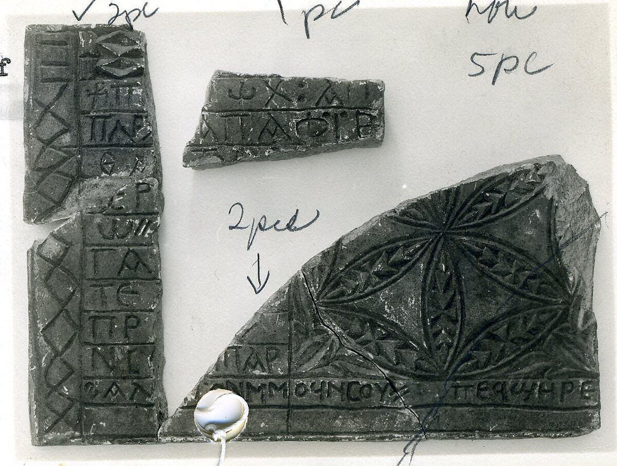 Fragments of an Inscribed Slab with a Rosette, Limestone; incised 