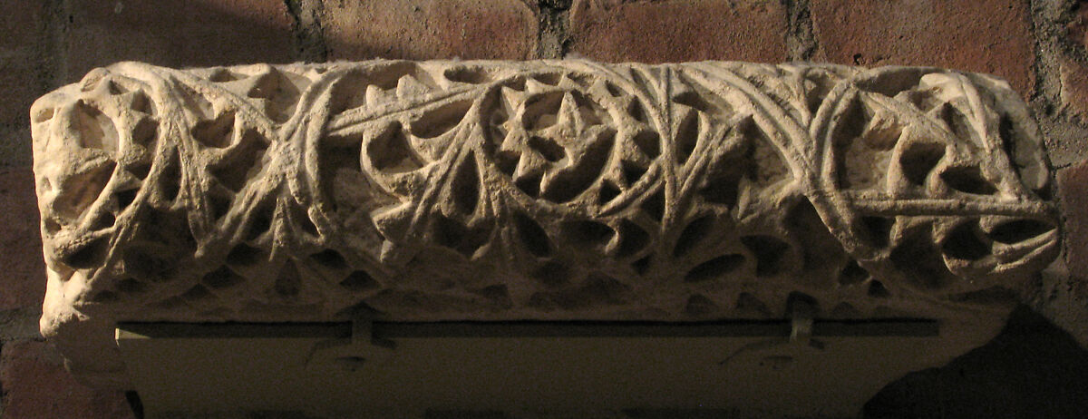 Fragment from a Molding with Scrolling Acanthus Leaves, Limestone; carved in relief