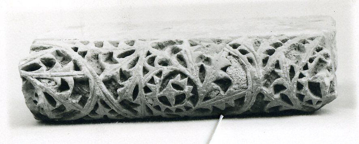 Fragment from a Molding with Scrolling Acanthus Leaves, Limestone; carved in relief 