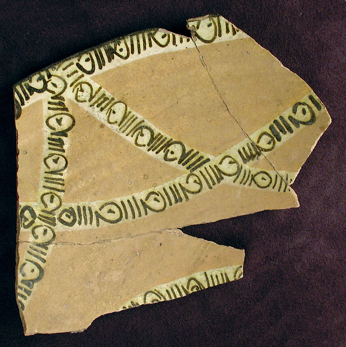 Fragment with Pseudo-Calligraphic Bands, Earthenware; polychrome decoration under transparent glaze 