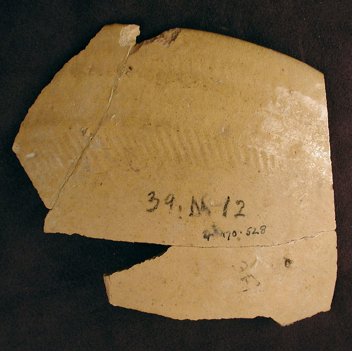 Fragment with Pseudo-Calligraphic Bands, Earthenware; polychrome decoration under transparent glaze