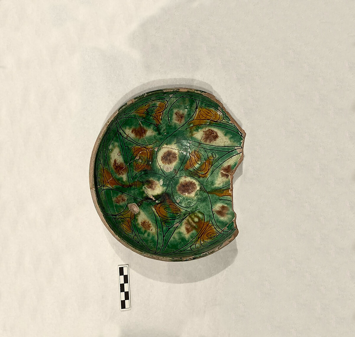 Two Imitation Splashware Bowls, Earthenware; white slip, incised and splashed with polychrome glazes under transparent glaze (sgraffito ware)