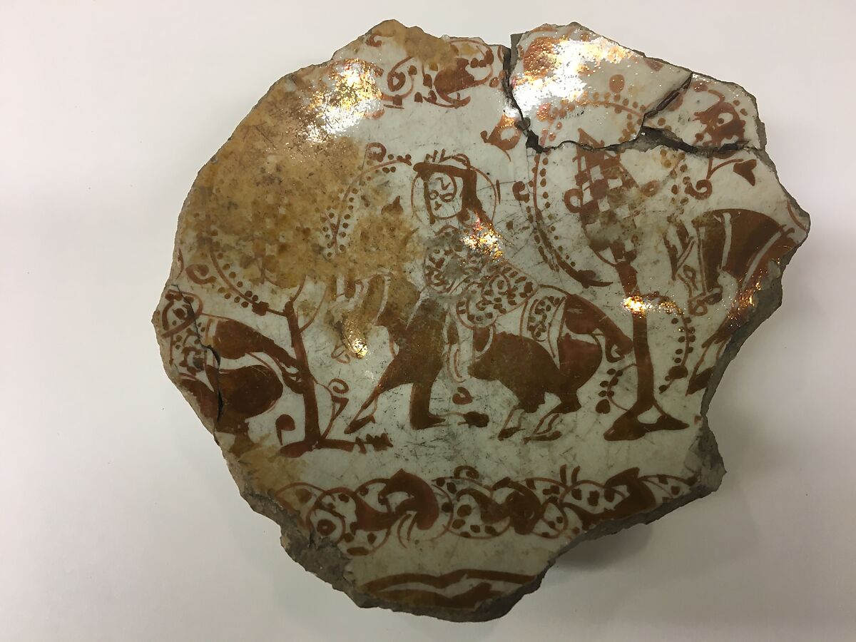 Fragment of a Bowl, Stonepaste; glazed, luster-painted 