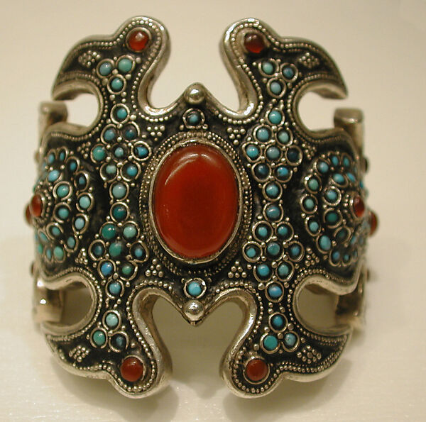 Armband, One of a Pair, Silver, with silver shot, unidentified black material, turquoise beads, and slightly domed carnelians