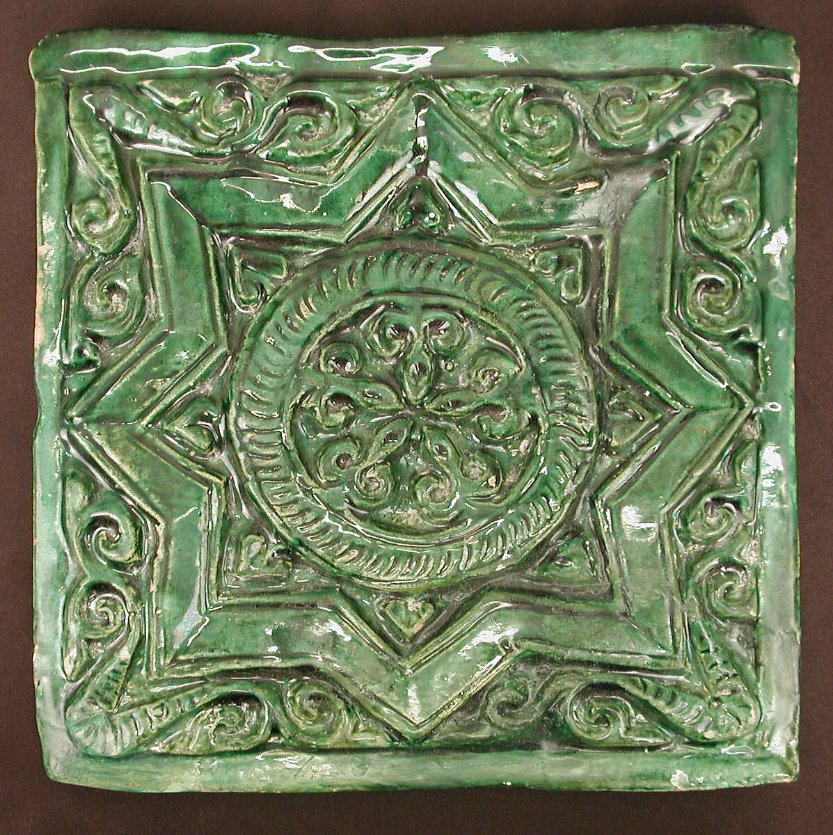 Green Tile with Star Design, Earthenware; molded decoration, monochrome glazed