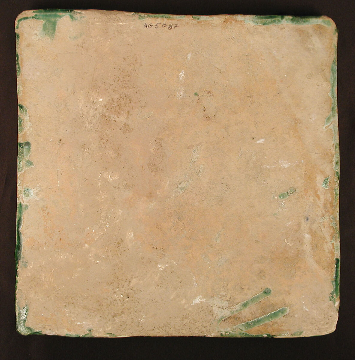 Green Tile with Star Design, Earthenware; molded decoration, monochrome glazed