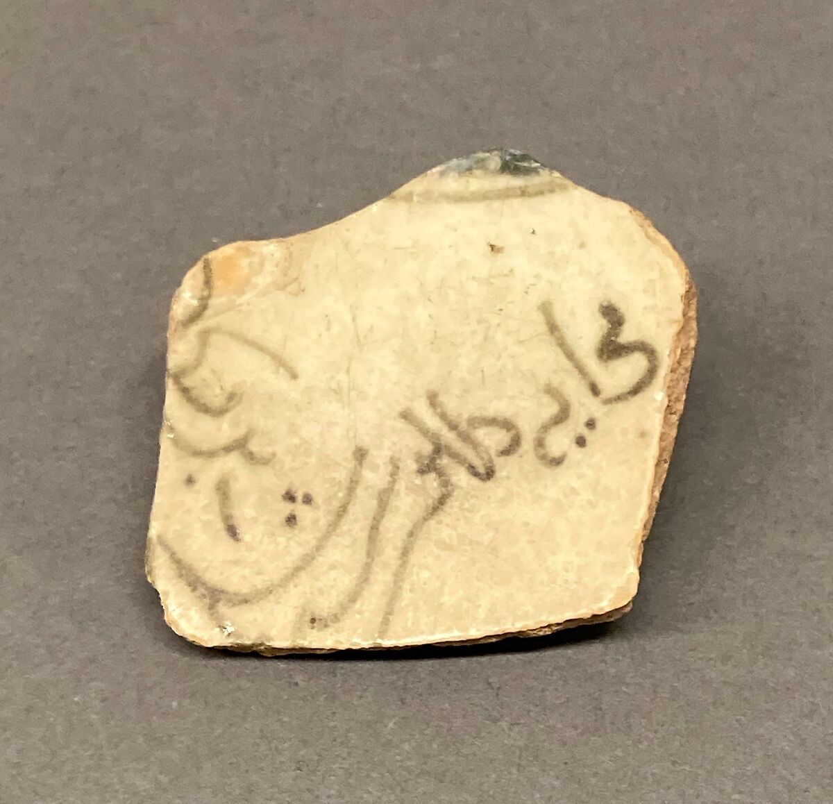 Fragment of a Bowl, Stonepaste; painted under transparent glaze