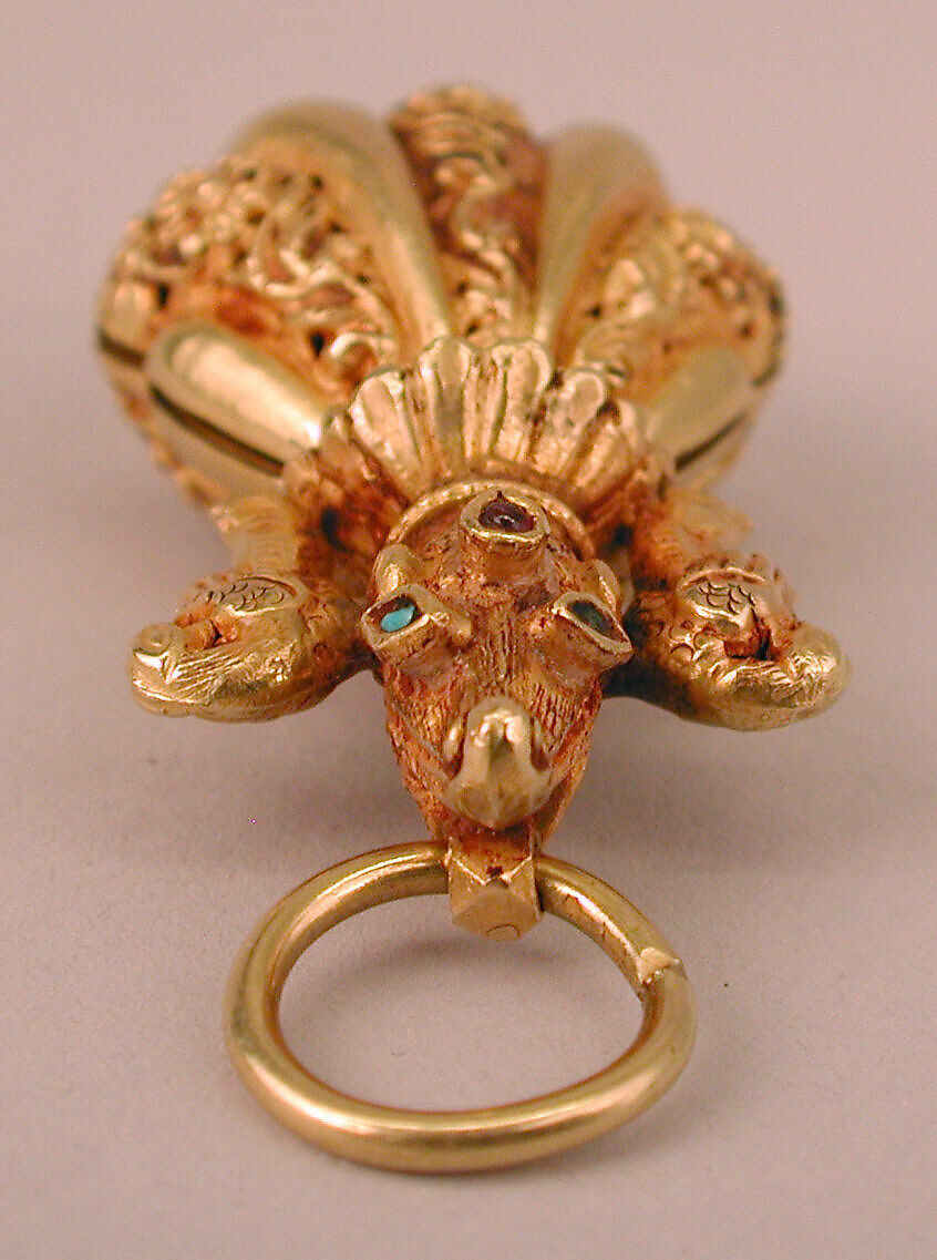 Locket Pendant, Possibly a Pomander, in Shape of Shell with Animal-Headed Cap Flanked by a Small Bird on Sides, Gold; cast, embossed and engraved, inlayed with turquoise and ruby