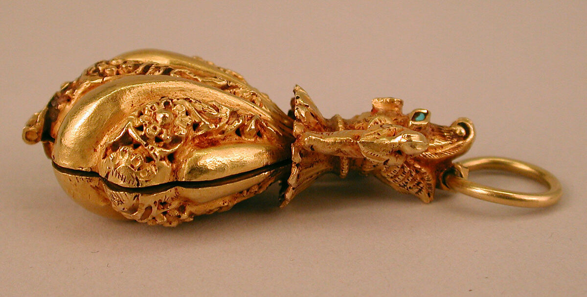 Locket Pendant, Possibly a Pomander, in Shape of Shell with Animal-Headed Cap Flanked by a Small Bird on Sides, Gold; cast, embossed and engraved, inlayed with turquoise and ruby