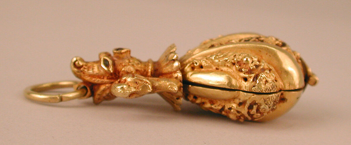 Locket Pendant, Possibly a Pomander, in Shape of Shell with Animal-Headed Cap Flanked by a Small Bird on Sides, Gold; cast, embossed and engraved, inlayed with turquoise and ruby