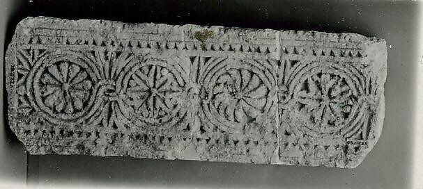 Fragment of a Frieze with Medallions, Limestone; carved 