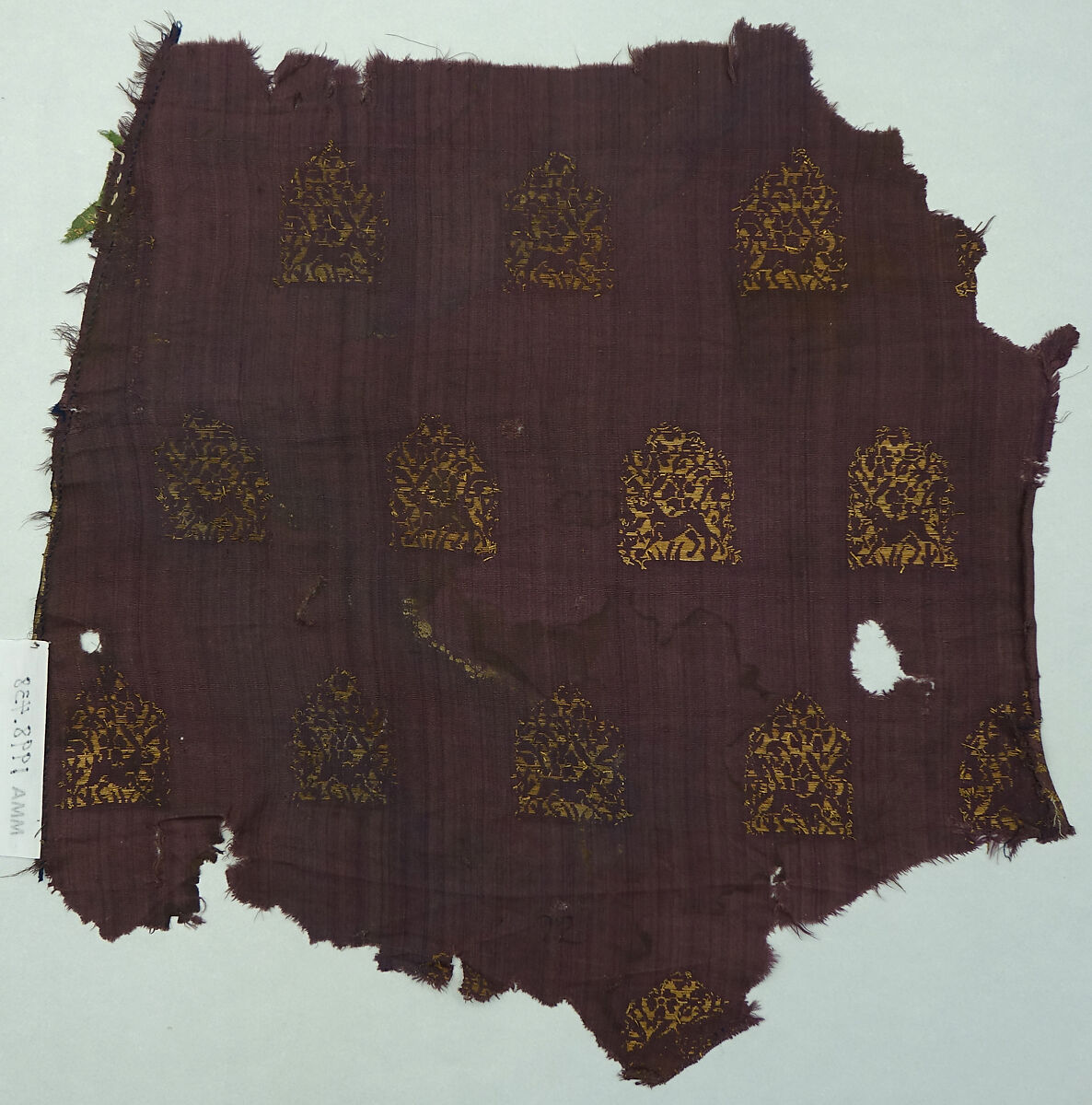 Textile fragment with hares, Warp-faced plain weave silk brocaded with gilt leather strips, China