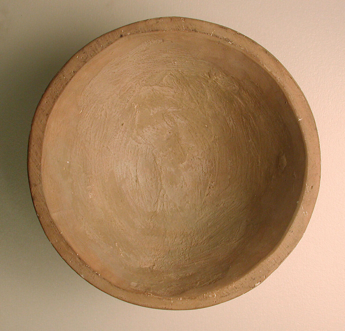 Cast from a Mold, Earthenware; molded and incised decoration, unglazed