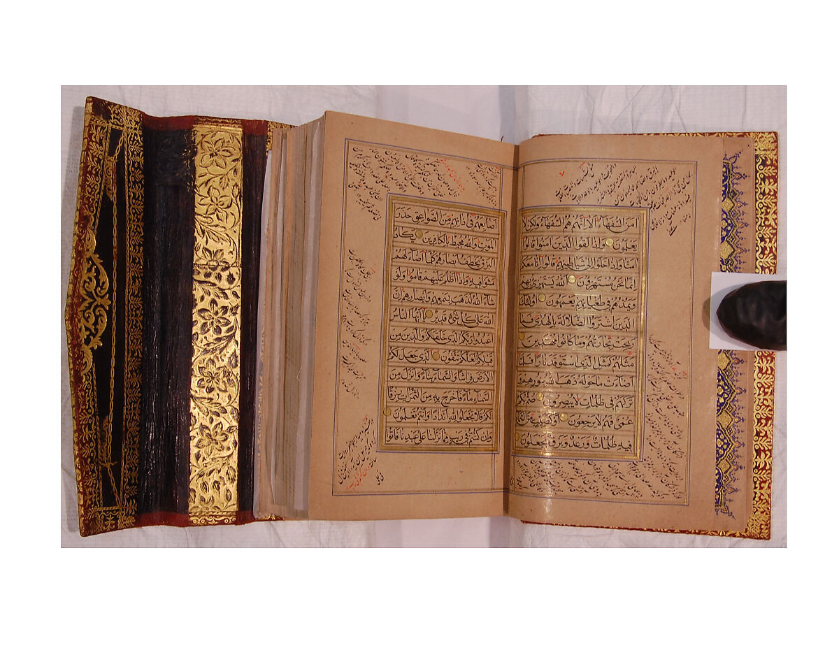 Qur'an Manuscript, Ink, gold, and lapis on paper; leather binding