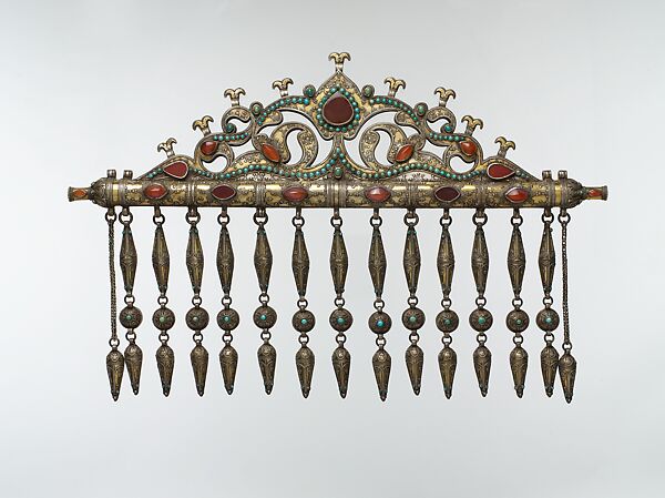 Wall Decoration in the Form of an Amulet, Silver, fire gilded, with openwork, silver shot, stamped beading, embossed pendants, cabochon and table cut carnelians, and turquoise beads 