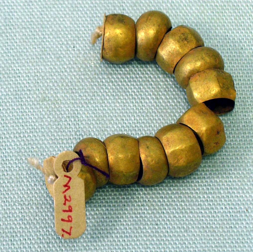 String of Beads, Gold leaf, wood 