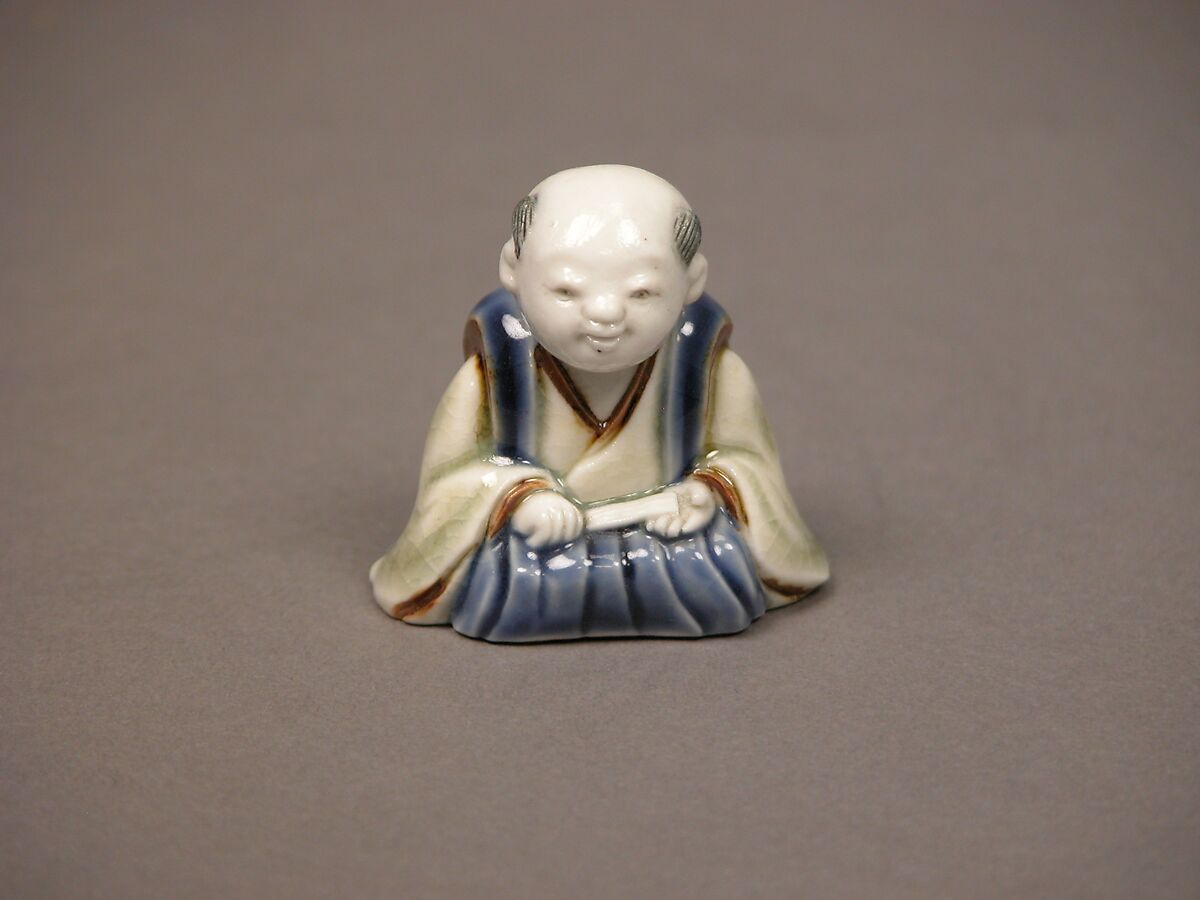 Chinese child with musical instrument, Porcelain with underglaze blue and iron decoration (Hirado ware), Japan