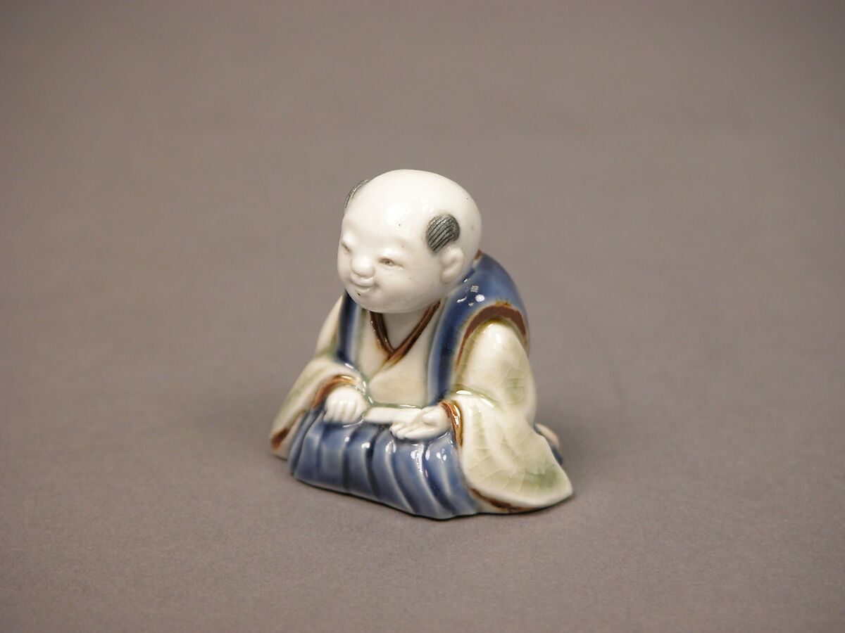 Chinese child with musical instrument, Porcelain with underglaze blue and iron decoration (Hirado ware), Japan