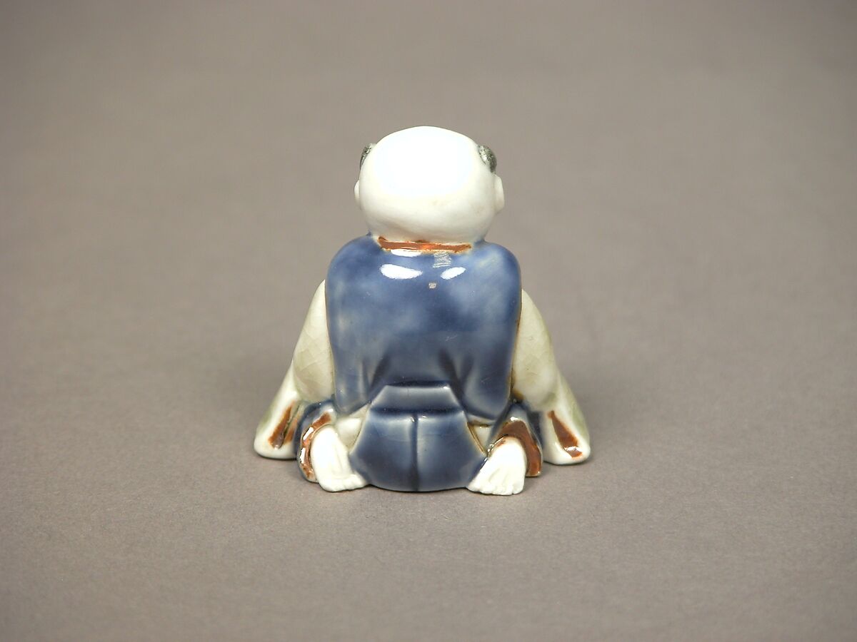 Chinese child with musical instrument, Porcelain with underglaze blue and iron decoration (Hirado ware), Japan
