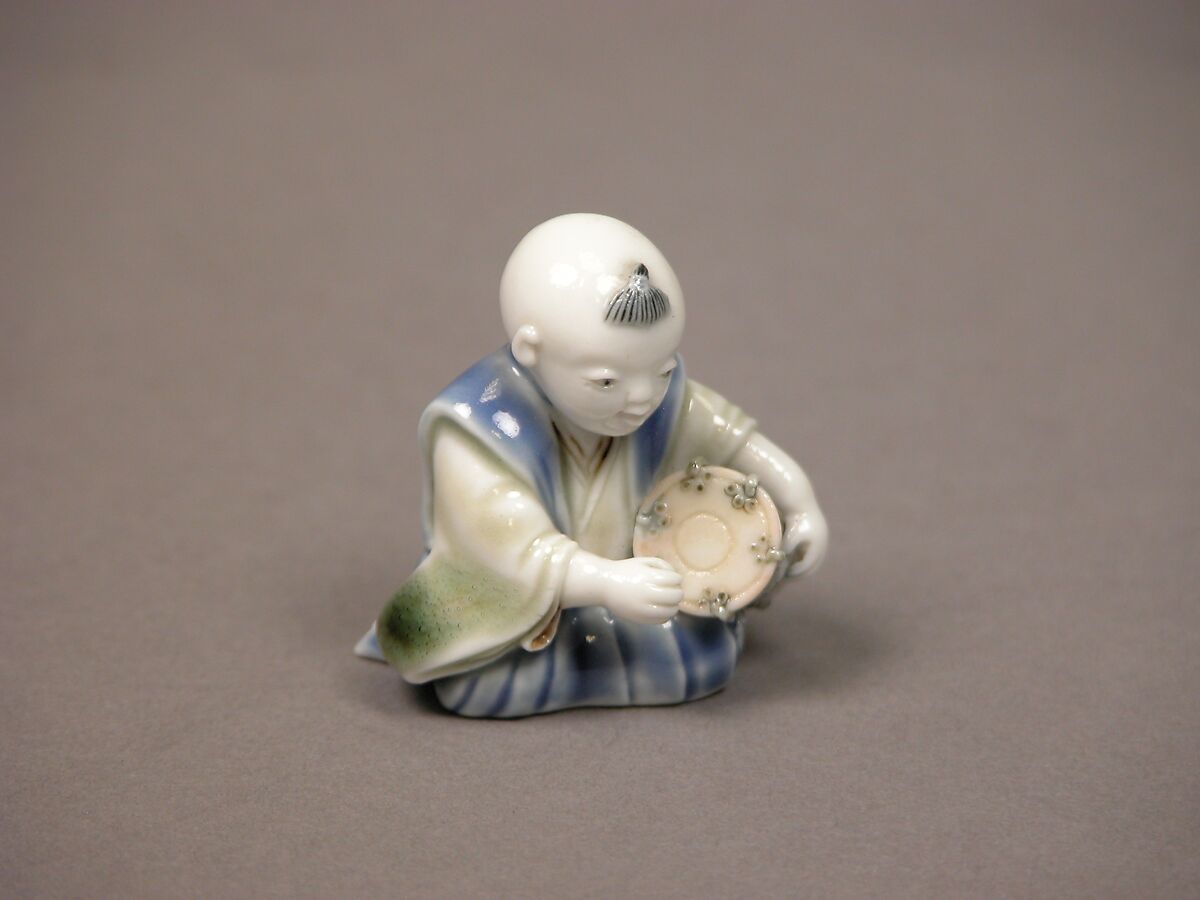 Chinese child with musical instrument, Porcelain with underglaze blue and iron decoration (Hirado ware), Japan 