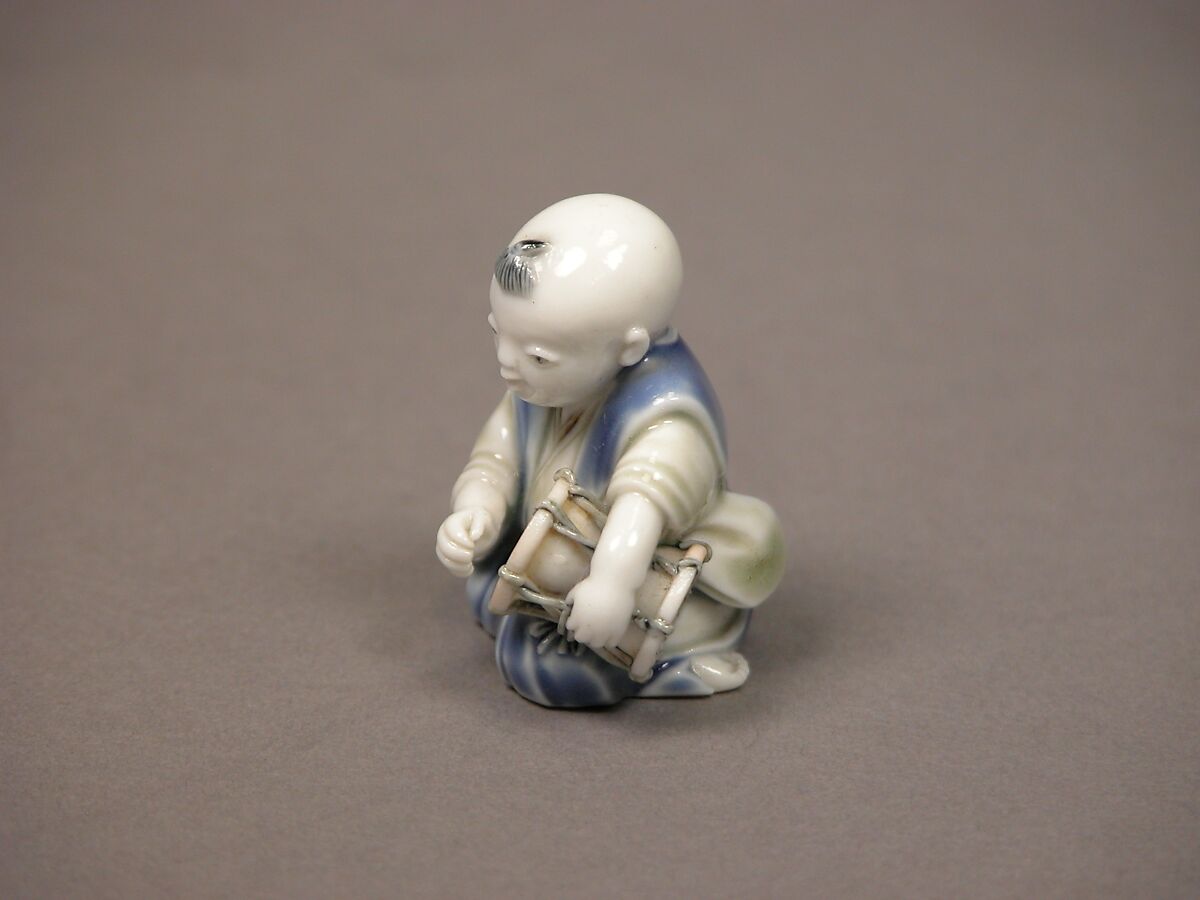 Chinese child with musical instrument, Porcelain with underglaze blue and iron decoration (Hirado ware), Japan