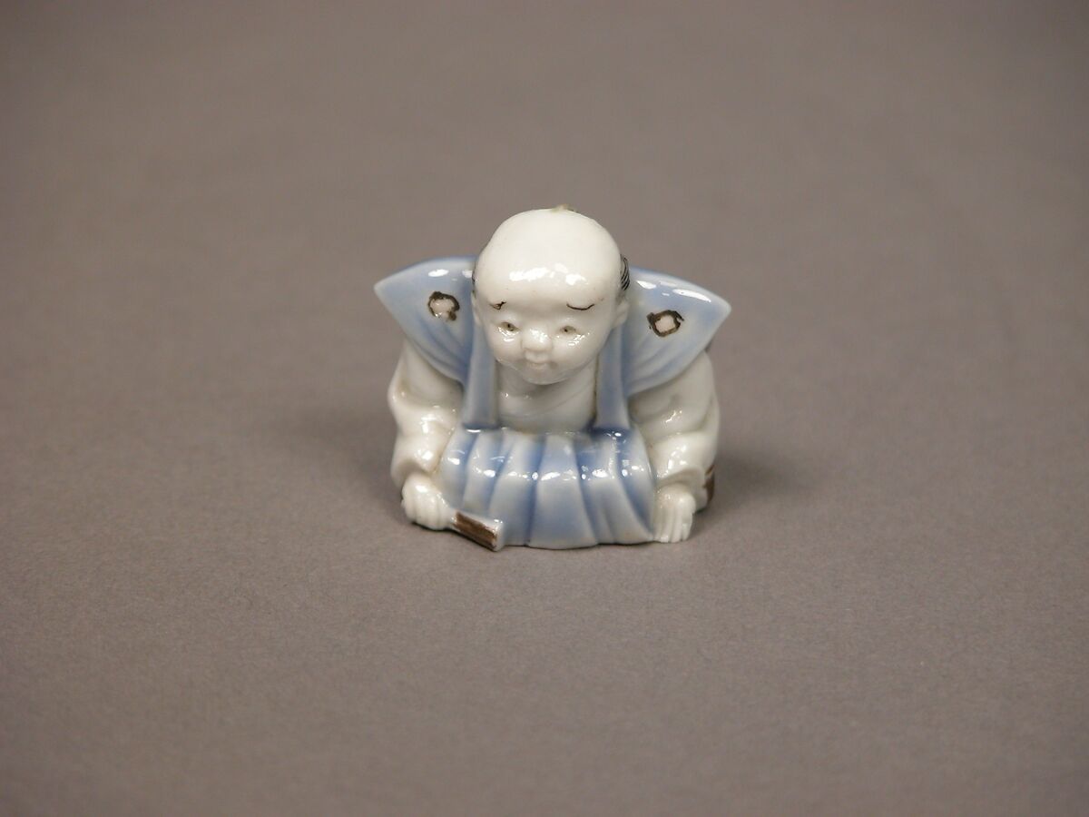 Chinese child with musical instrument, Porcelain with underglaze blue and iron decoration (Hirado ware), Japan 