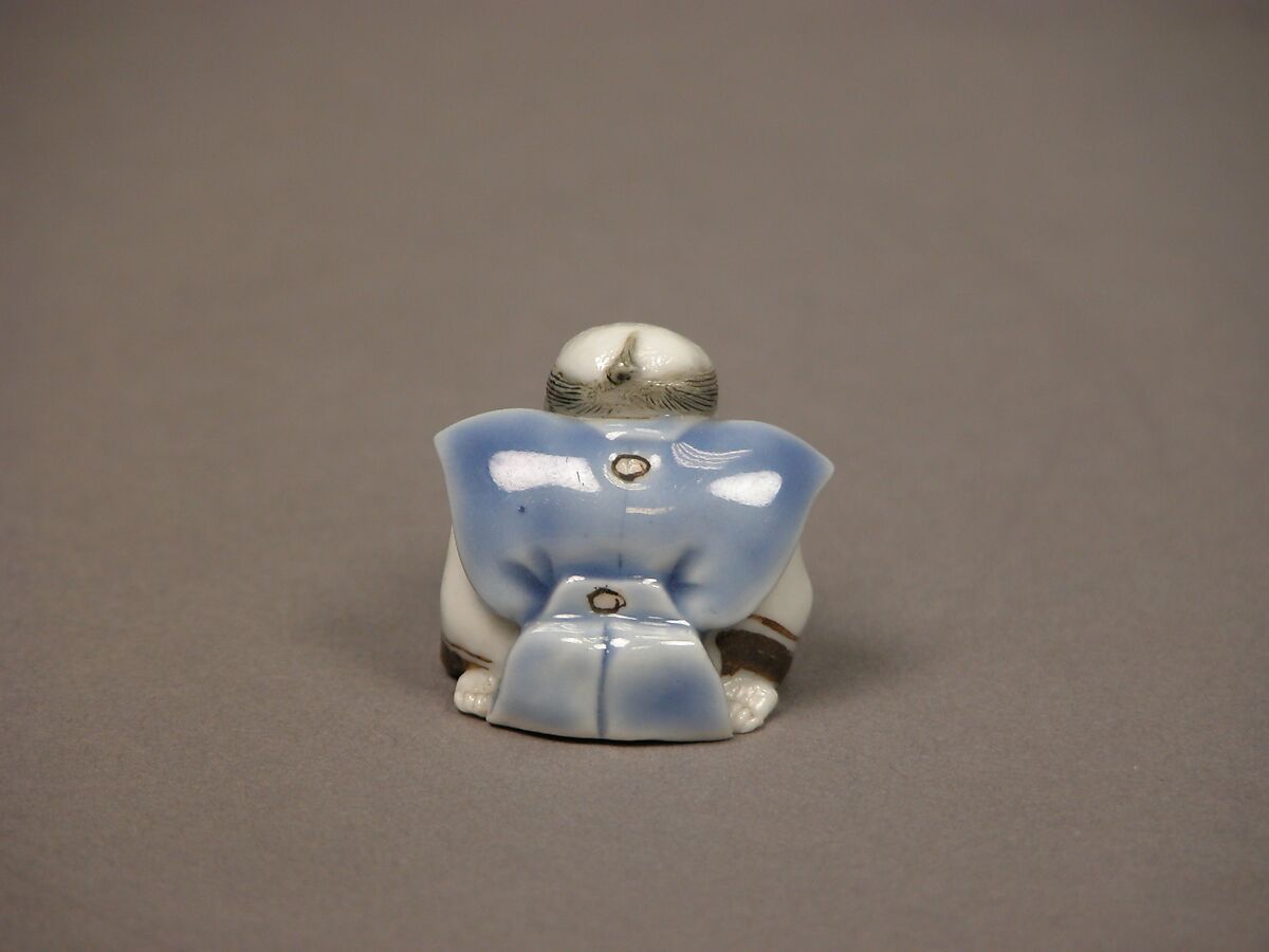 Chinese child with musical instrument, Porcelain with underglaze blue and iron decoration (Hirado ware), Japan