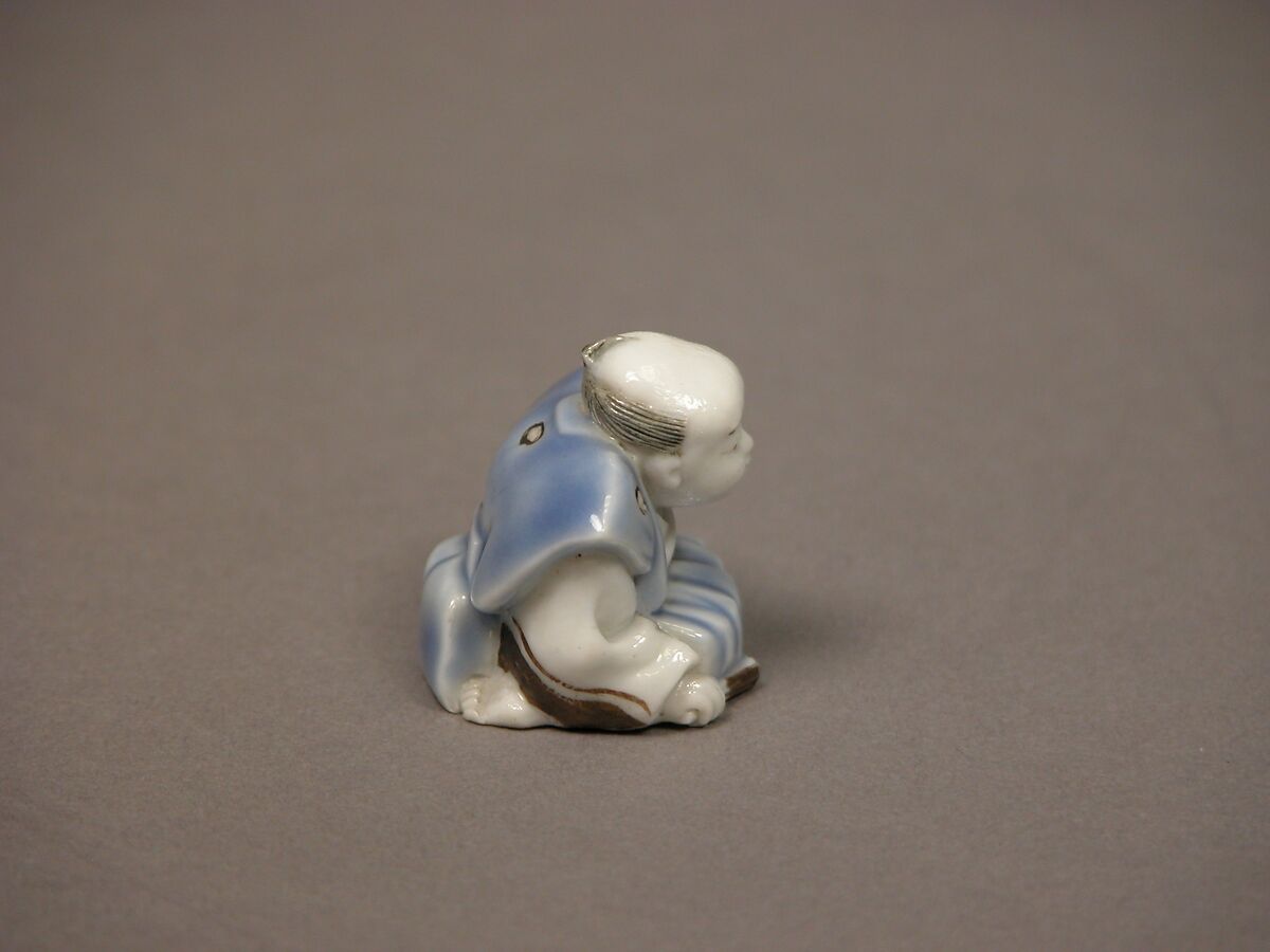 Chinese child with musical instrument, Porcelain with underglaze blue and iron decoration (Hirado ware), Japan