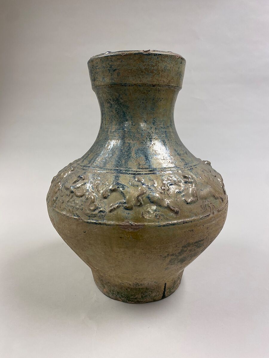 Wine container (hu) with mythical creatures, Earthenware with lead green glaze, China 