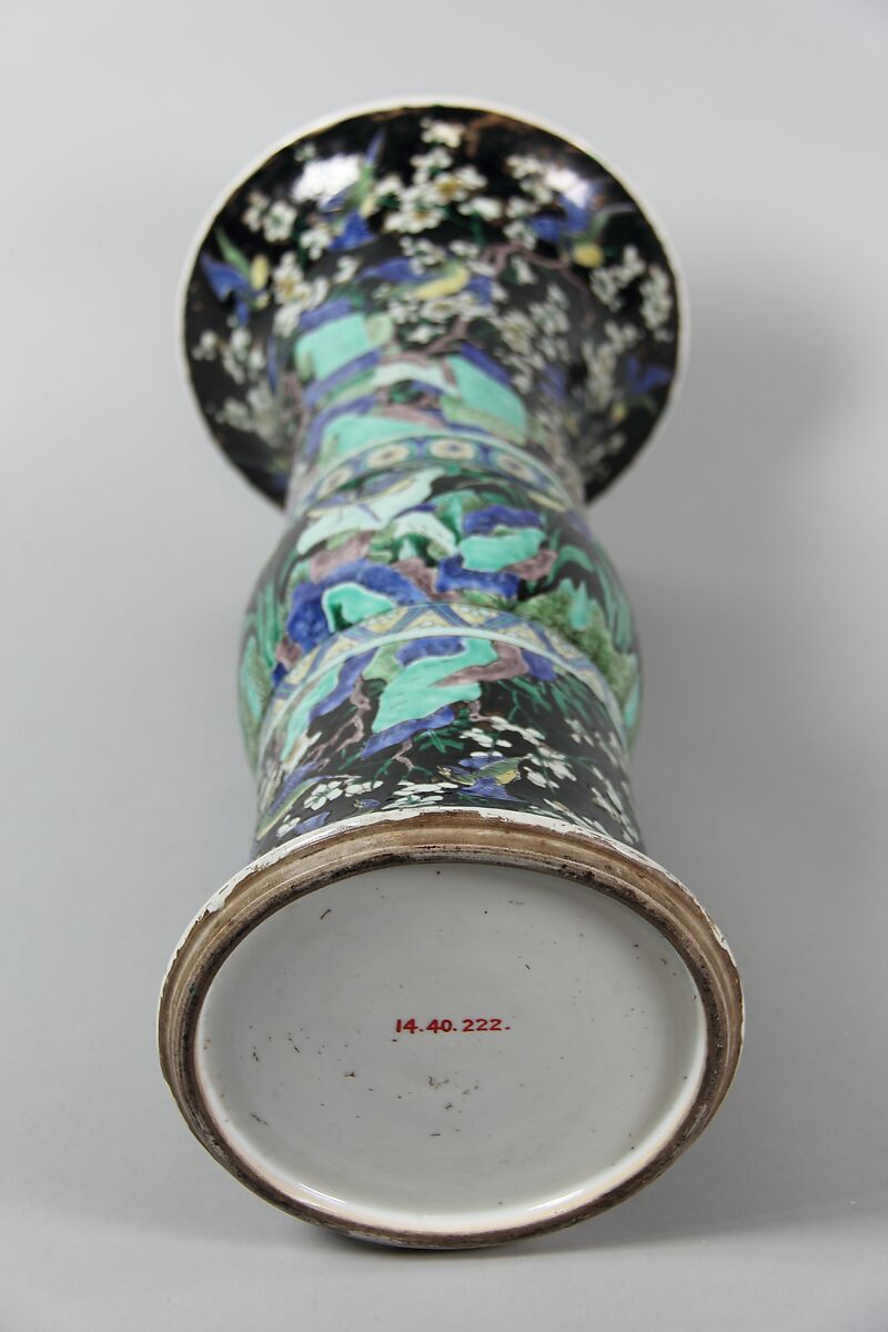 Vase with birds and flowers, PPorcelain painted in polychrome enamels over a black ground (Jingdezhen ware, famille noire), wooden stand, China