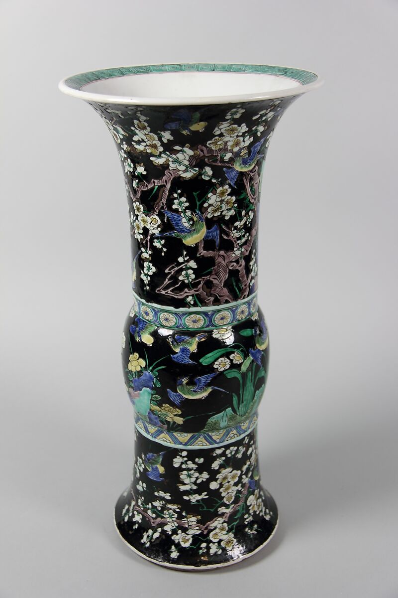 Vase with birds and flowers, PPorcelain painted in polychrome enamels over a black ground (Jingdezhen ware, famille noire), wooden stand, China 