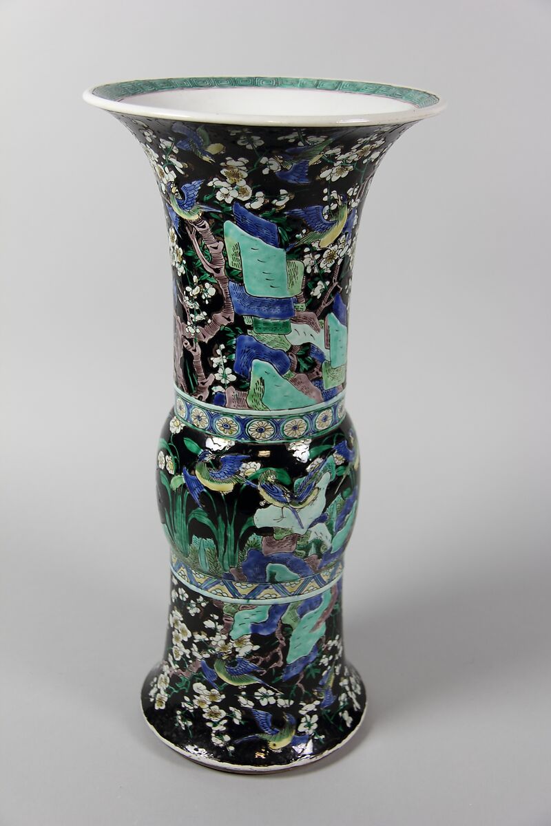 Vase with birds and flowers, PPorcelain painted in polychrome enamels over a black ground (Jingdezhen ware, famille noire), wooden stand, China