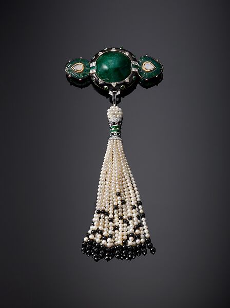 Shoulder Brooch, Cartier (French, founded Paris, 1847), Brooch: platinum, set with emeralds, rubies, diamonds, enamel, and gold; tassel: pearls and onyx beads 