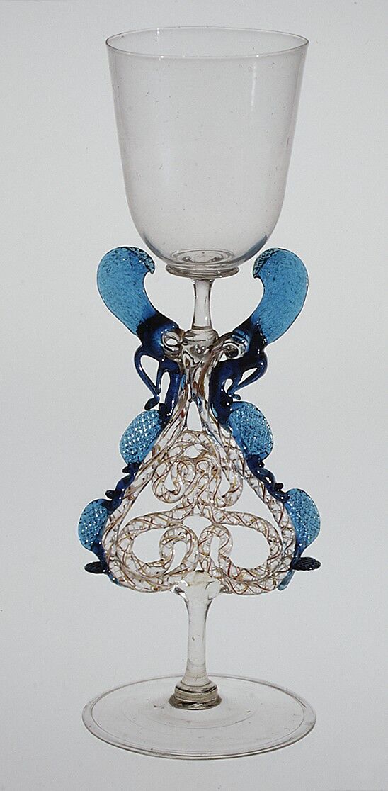 Goblet, Colorless (yellowish), transparent turquoise blue, and opaque brick red, yellow, and white nonlead glass.  Blown, trailed, pincered, "vetro a retorti"., Façon de Venise, probably south Lowlands or Germany 