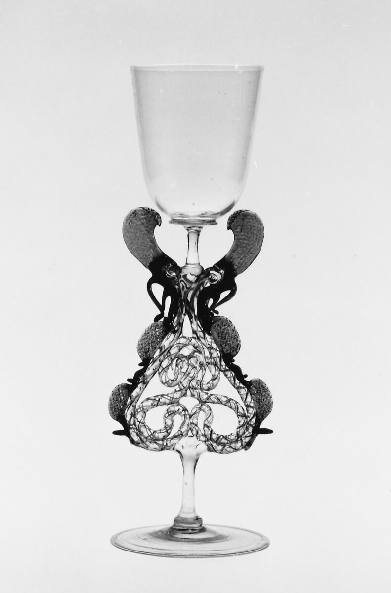 Goblet, Colorless (yellowish), transparent turquoise blue, and opaque brick red, yellow, and white nonlead glass.  Blown, trailed, pincered, "vetro a retorti"., Façon de Venise, probably south Lowlands or Germany