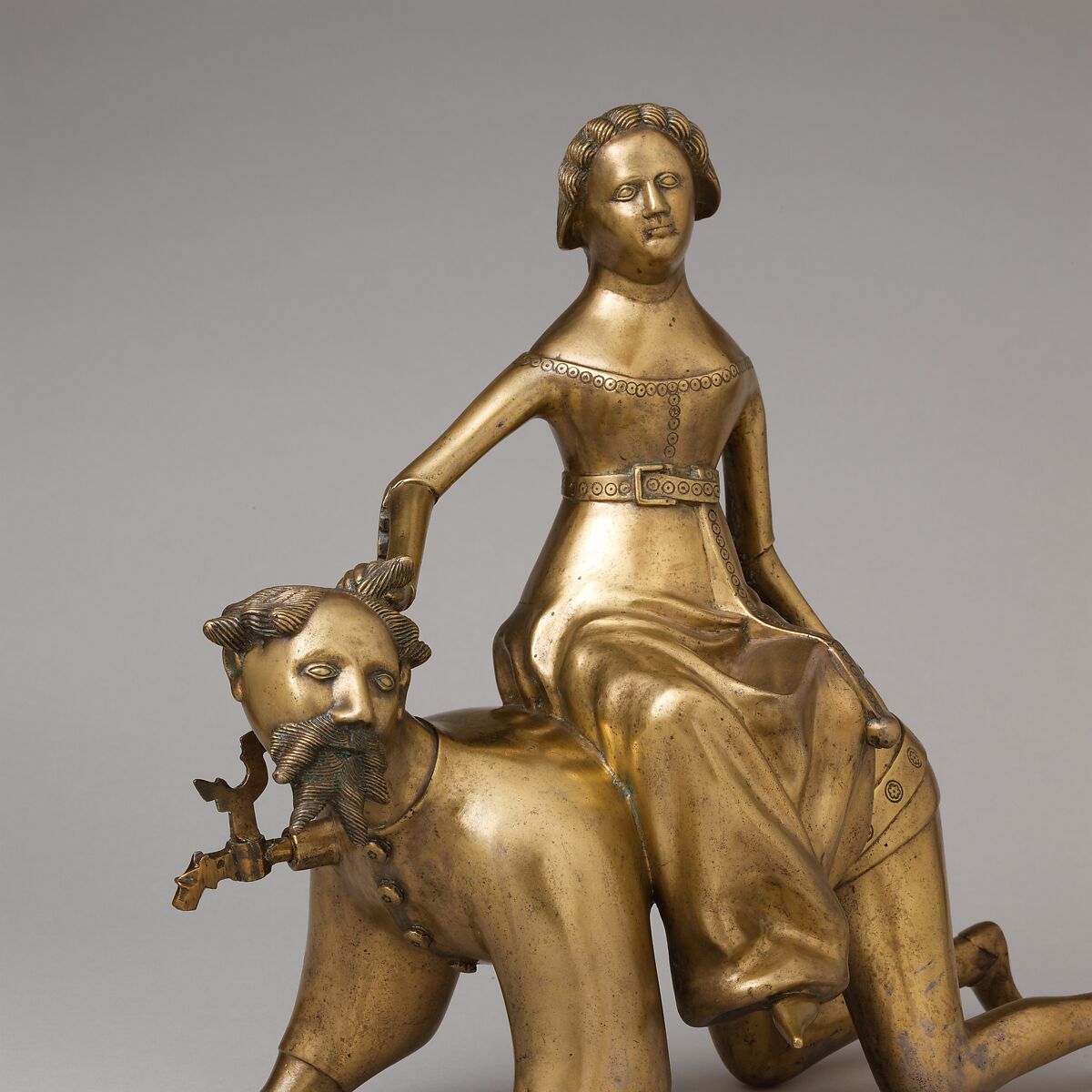 Aquamanile in the Form of Aristotle and Phyllis, Bronze; Quaternary copper alloy (approx. 72% copper, approx. 17% zinc,
approx. 6% lead, approx. 3% tin)., South Netherlandish