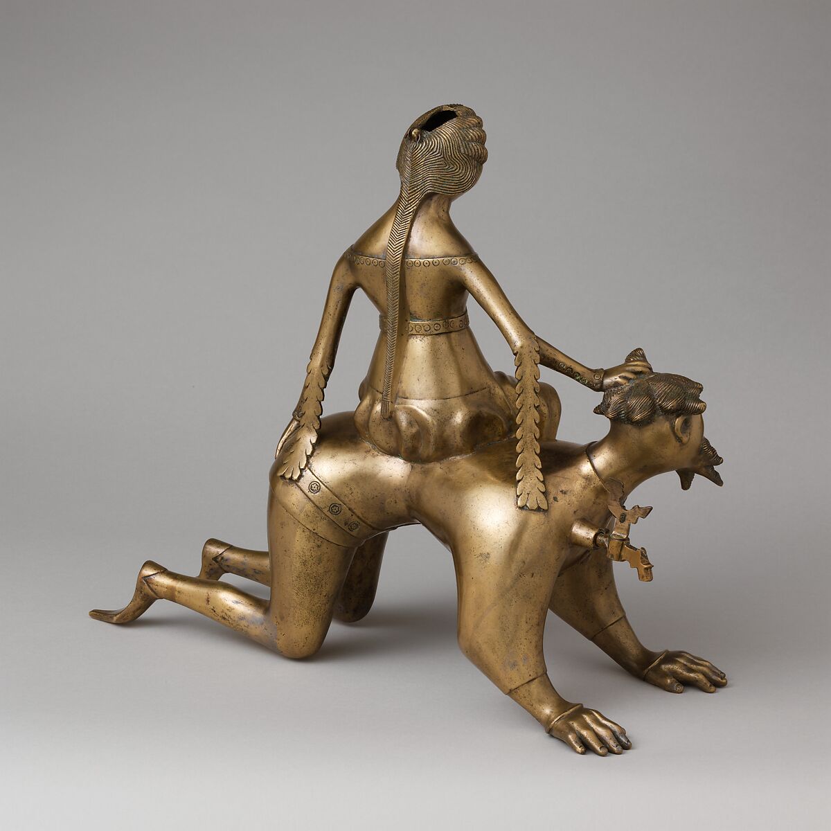 Aquamanile in the Form of Aristotle and Phyllis, Bronze; Quaternary copper alloy (approx. 72% copper, approx. 17% zinc,
approx. 6% lead, approx. 3% tin)., South Netherlandish