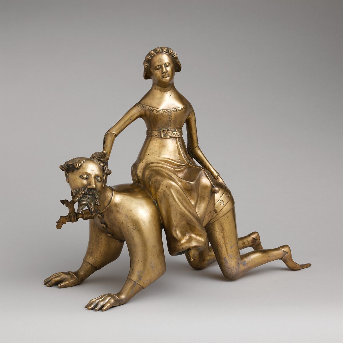 Aquamanile in the Form of Aristotle and Phyllis, Bronze; Quaternary copper alloy (approx. 72% copper, approx. 17% zinc,
approx. 6% lead, approx. 3% tin)., South Netherlandish