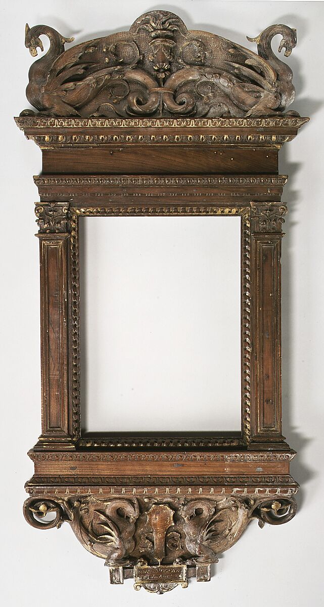 Tabernacle frame, possibly del Tasso workshop, Walnut. Carved, luminolegno., Italian