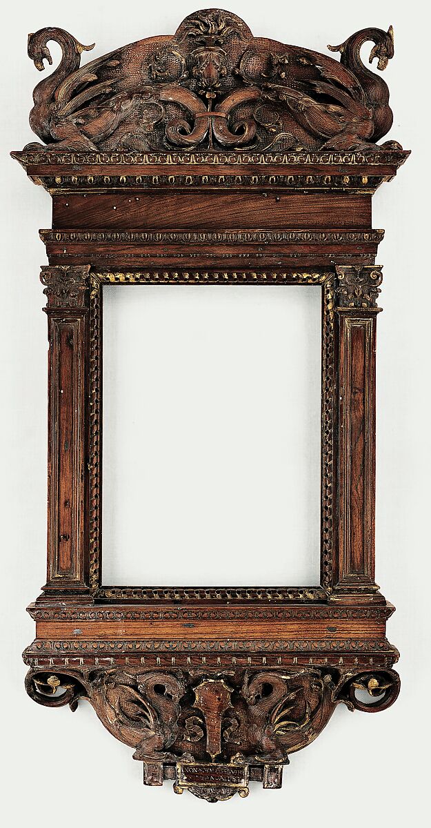 Tabernacle frame, possibly del Tasso workshop, Walnut. Carved, luminolegno., Italian