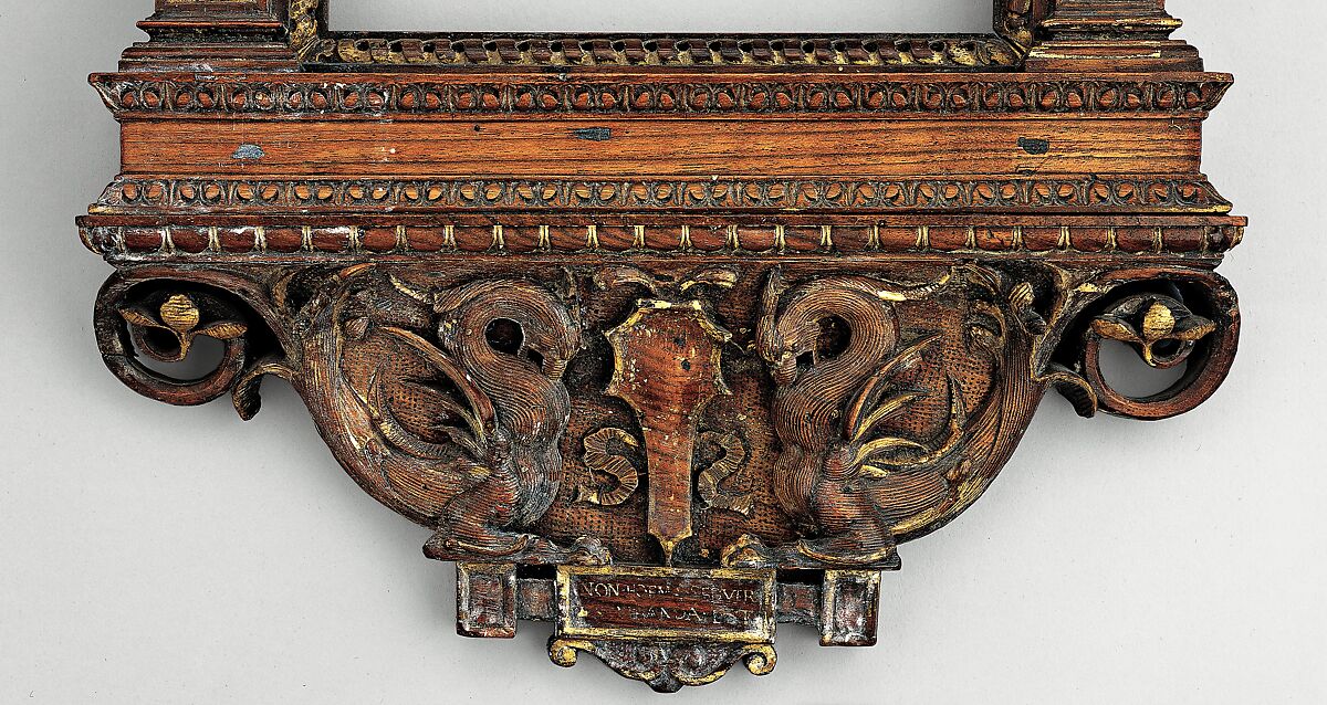 Tabernacle frame, possibly del Tasso workshop, Walnut. Carved, luminolegno., Italian