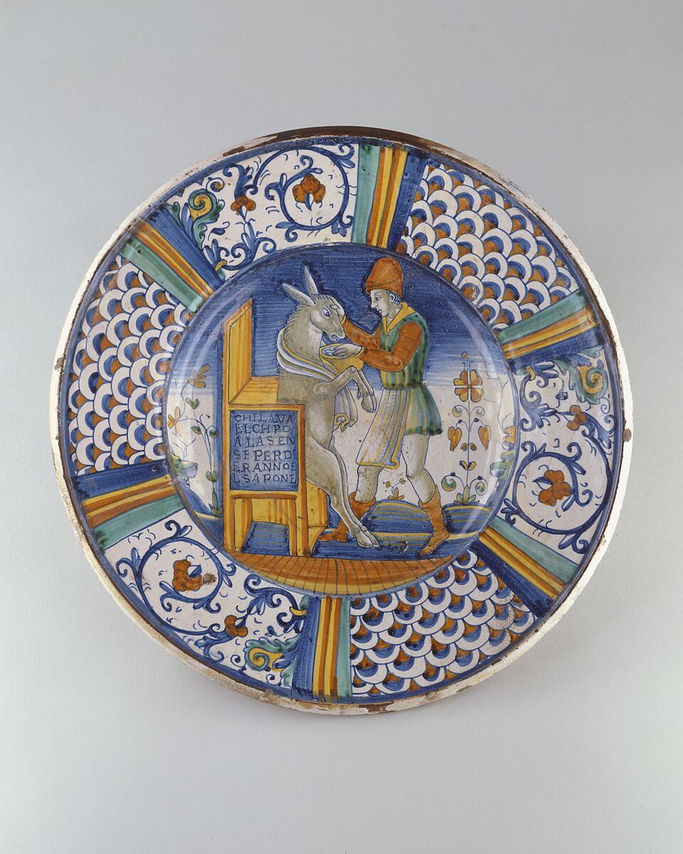 Dish (piatto): Man Washing the Mouth of an Ass, Maiolica (tin-glazed earthenware), Italian, Deruta 