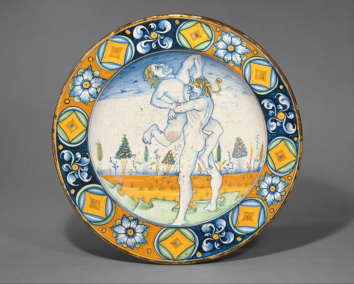 Dish (piatto); The story of Hercules: Hercules lifts the giant Antaeus clear of the Earth, his mother, from whom he derived his phenomenal strength, Maiolica (tin-glazed earthenware), Italian, Deruta 