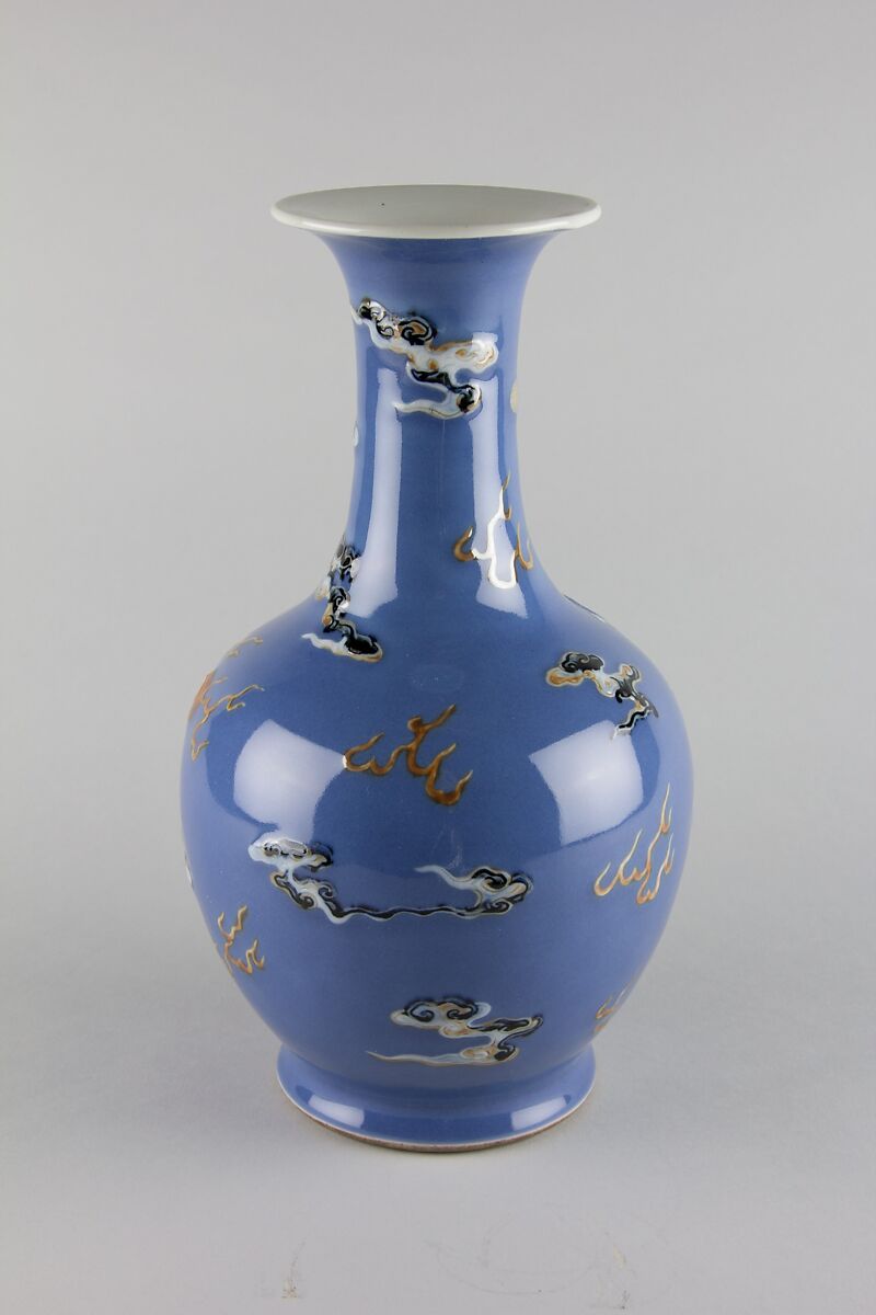Vase with dragon, Porcelained decorated in low relief with underglaze painting against a blue glaze (Jingdezhen ware), China