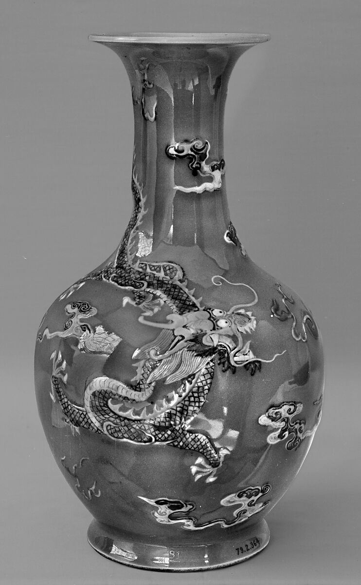 Vase with dragon, Porcelained decorated in low relief with underglaze painting against a blue glaze (Jingdezhen ware), China