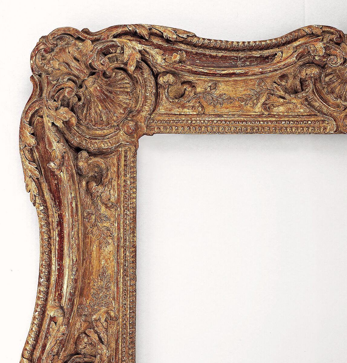Swept frame, Oak lower moldings and feather keys; lime upper moldings, French