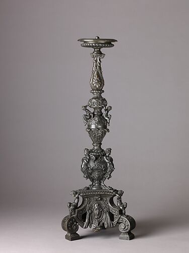Candlestick Supported by Putti