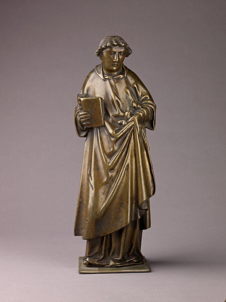 Saint Stephen, Brass (copper alloy with a high percentage of
zinc) with natural olive green patina., Netherlandish, Tournai 