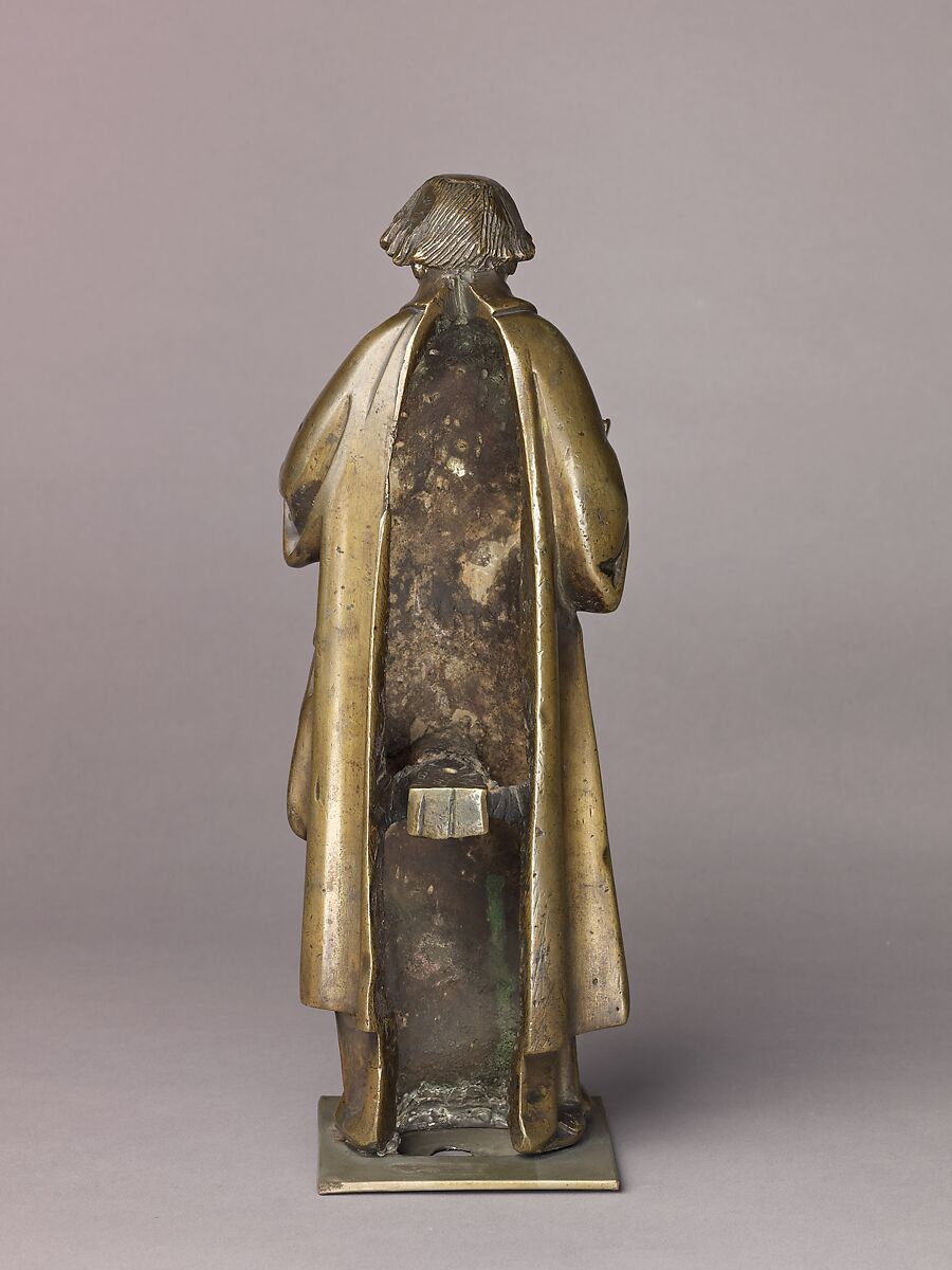 Saint Stephen, Brass (copper alloy with a high percentage of
zinc) with natural olive green patina., Netherlandish, Tournai